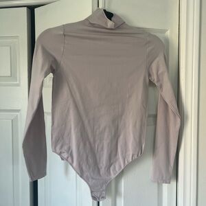 Skims long sleeve bodysuit size L/XL